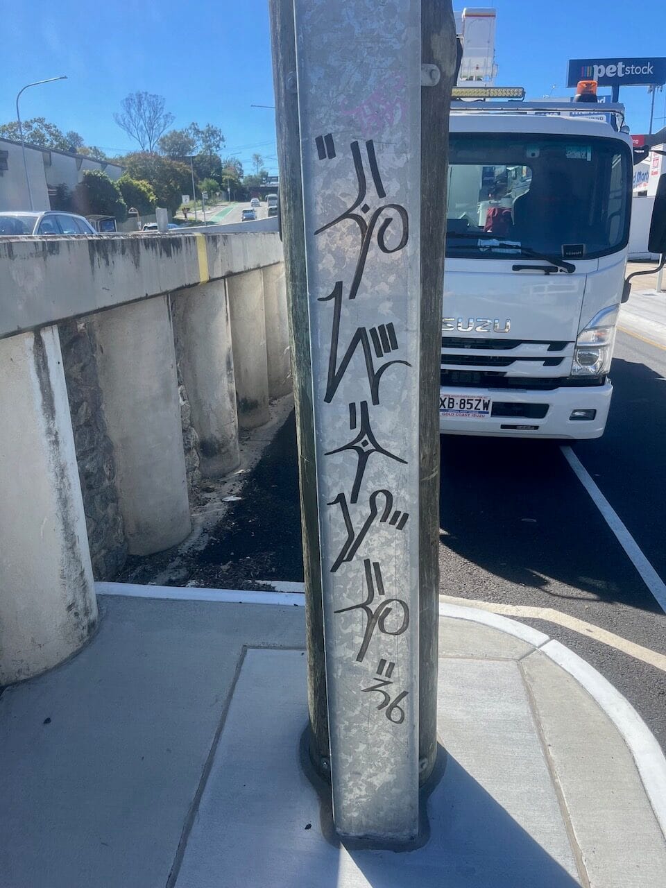 Utility cabinet with heavy graffiti before removal
